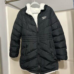 reebok women’s coat. size L/G. reversible. black and white.